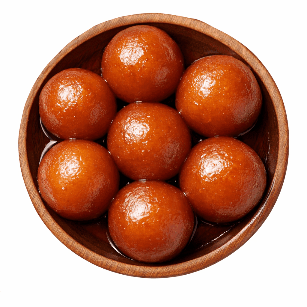 Golden deep-fried Gulab Jamun balls in a wooden bowl soaked in sugar syrup