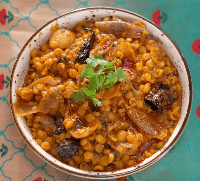 Ranveer Brar's Dhaba Style Chana Dal with coal smoke finish in a rustic serving bowl