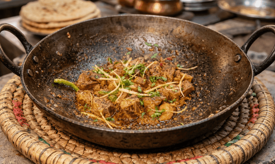 Mutton Karahi with bone-in gosht in a dark iron karahi, coal-smoked and bhunai-style