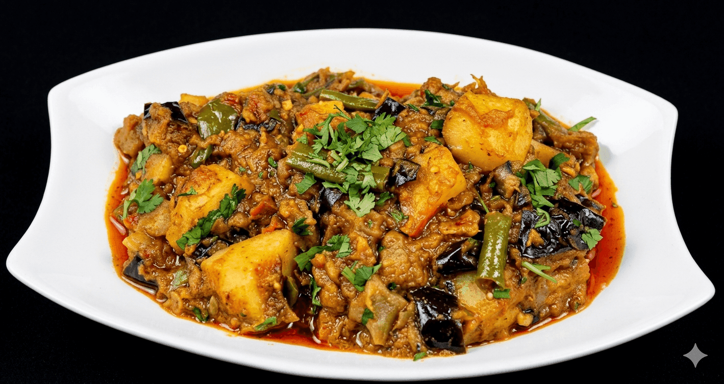 Aloo Baingan potato and eggplant curry in a spiced onion-tomato masala in a pan
