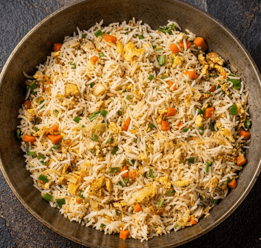 Restaurant-style egg fried rice with scrambled eggs, spring onions, and soy sauce